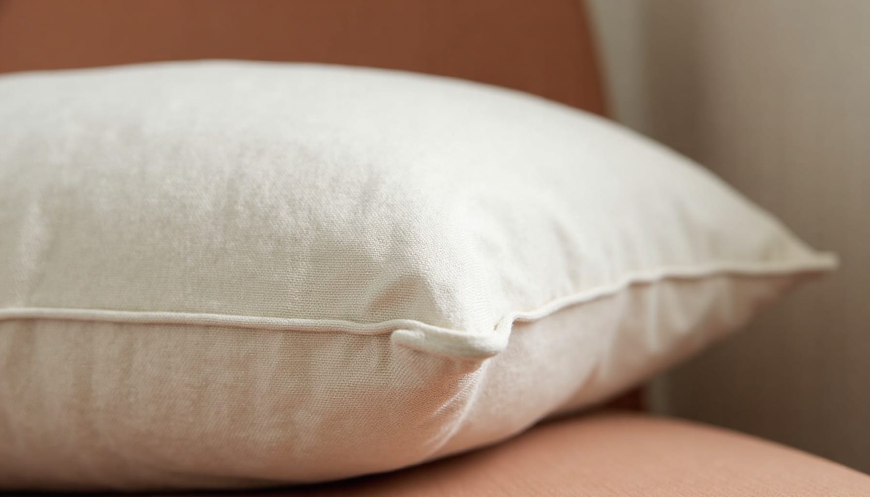 linen cushion styling — warm minimal detail