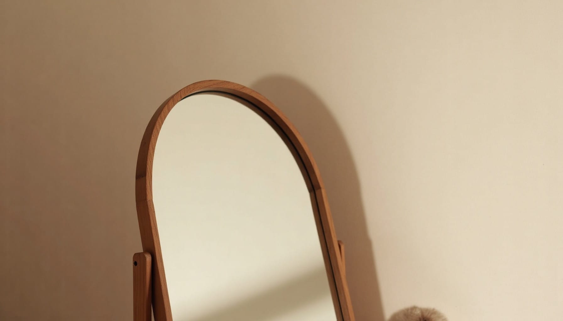 small mirror — warm minimal detail