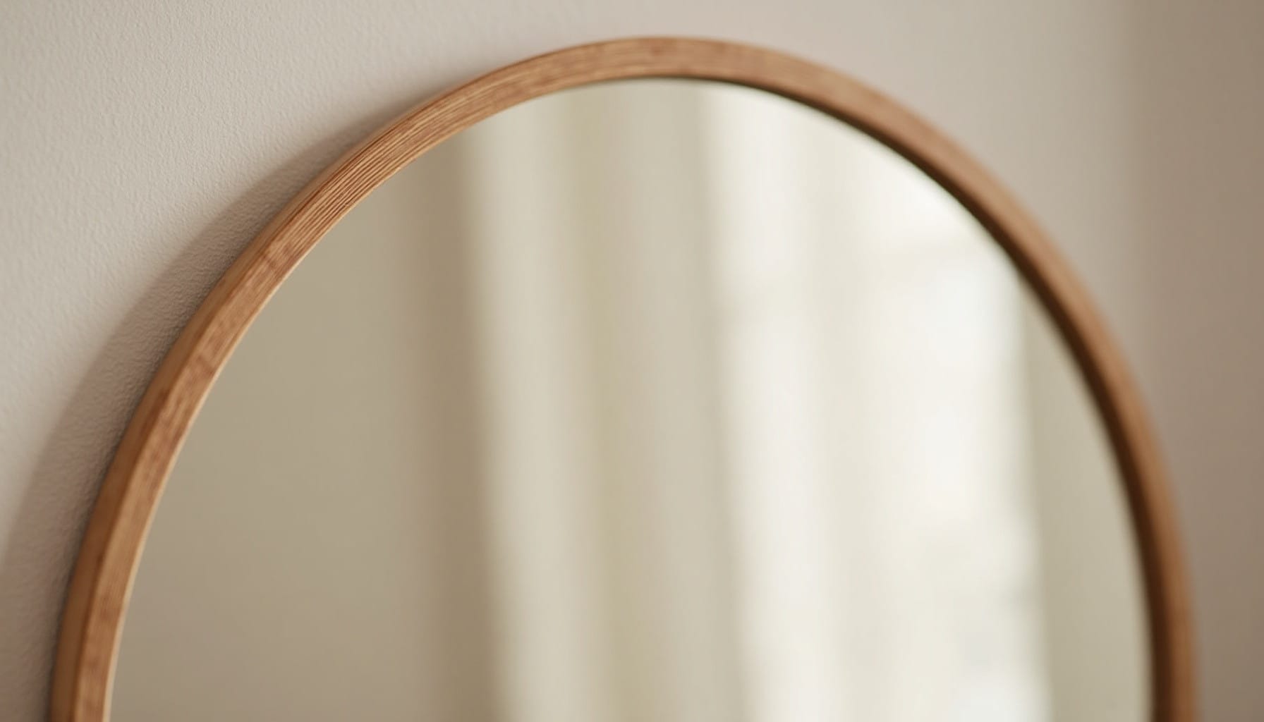 bedroom mirror — warm minimal detail